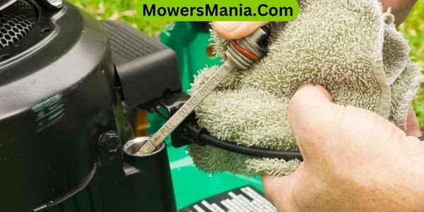 How to remove excess oil from a lawn mower