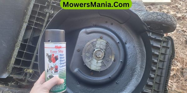 What do you spray a mower deck with