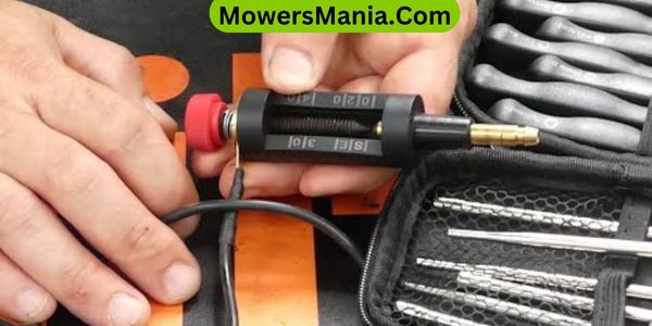 testing spark plug on lawn mower
